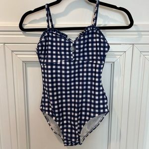 Size L (10/12) Target girls bathing suit. Tried on but never worn.